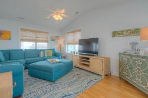 TV a/nebo společenská místnost v ubytování Slip Away