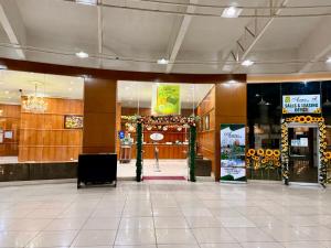 a lobby of a shopping center with a store at Albergo Hotel - Studio Condo Unit - Baguio Transient in Baguio