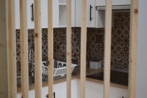 a bathroom with a white tub and a sink at Brisa del Mar in Tacoronte +22 photos