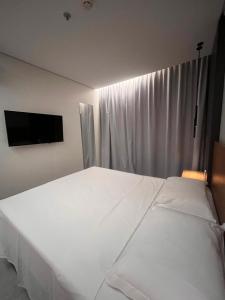 Katil atau katil-katil dalam bilik di Salinas Premium Resort