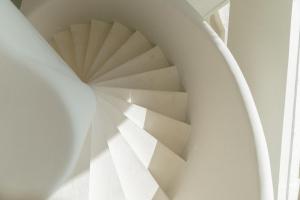 a view of a spiral staircase in a building at NOUR Uluwatu in Uluwatu