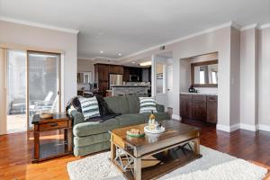 a living room with a couch and a table at Overlook 08 with Wintergreen Advantage in Wintergreen