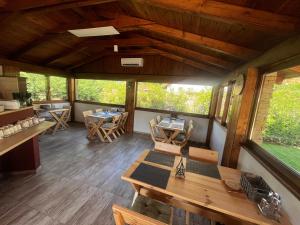 an overhead view of a cabin with tables and chairs at Carp Land Camp in Balatonszepezd