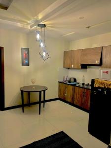 Kuchyň nebo kuchyňský kout v ubytování Elite 2BHK, Travellers Game + 14 fotografií