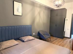 Postel nebo postele na pokoji v ubytování Brand-New 2Bedroom Apartment with Open Balcony in New Luxury Building CITY CENTER, By Malibu Garden