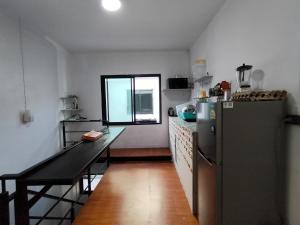 Kuchyň nebo kuchyňský kout v ubytování Den Nest Guest House KRABI + 20 fotografií