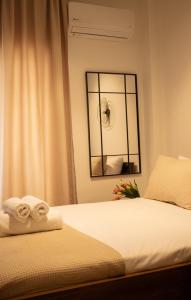 Ένα ή περισσότερα κρεβάτια σε δωμάτιο στο Vivere Suite 01 - Cozy Studio by Metro terminus