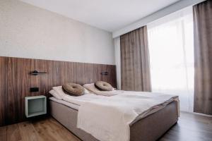 Ένα ή περισσότερα κρεβάτια σε δωμάτιο στο Targowa 53 - Green & Central