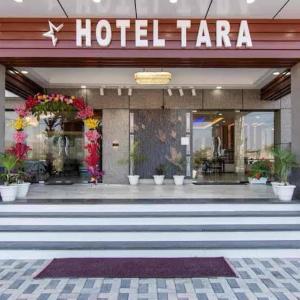 a hotel tarara with a sign on the front of it at Tara Hotel & Restaurant in Kallar