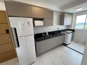 Dapur atau dapur kecil di Charmoso apê nas alturas
