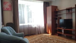 Μια τηλεόραση ή/και κέντρο ψυχαγωγίας στο Stropi Apartment Daugavpils