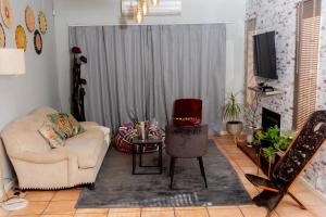 Fotografie z fotogalerie ubytování Chic and Secure Phakalane Stay v destinaci Gaborone + 8 fotografií