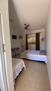 Katil atau katil-katil dalam bilik di Hotel Itiquira