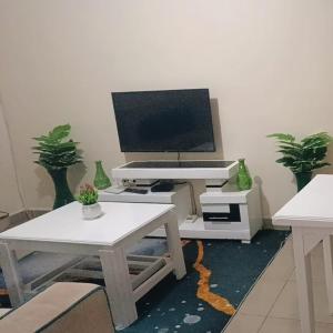 TV a/nebo společenská místnost v ubytování EuphGlory Accomodations 1 bedroom