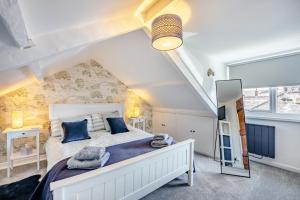 Voodi või voodid majutusasutuse The Workers Cottage toas