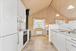 Una cocina o cocineta en 3673-Nexo-Frederiksvej-54 14 fotos más