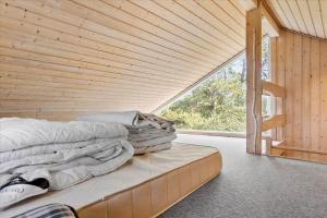 Una cama o camas en una habitación de 3673-Nexo-Frederiksvej-54