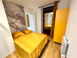 Postel nebo postele na pokoji v ubytování L'évasion Ansoise + 4 fotografie