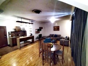 a living room with a couch and a table at White House Suites in Beirut