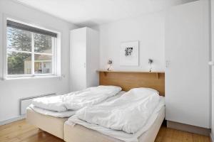 Giường trong phòng chung tại HA269-Hals-Portlandsvej-129-1-th