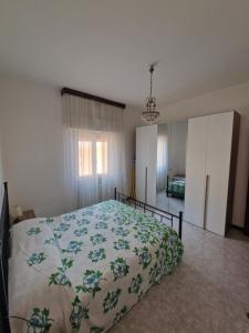 Giường trong phòng chung tại La casa dei Limoni