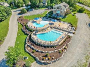 an aerial view of a swimming pool at a resort at RECONNECT the LINE with Friends & Family - 7 King Bed in Hollister