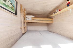 an empty room in a wooden sauna with shelves at 6832-Hasle-Toftegardsvej-20-C in Hasle