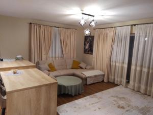 Ένα ή περισσότερα κρεβάτια σε δωμάτιο στο Apartament Vivamus Residence Brasov