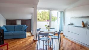 Kuchyňa alebo kuchynka v ubytovaní Apartment Lunta + 17 fotografií