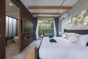 Katil atau katil-katil dalam bilik di Sawasdee pool villa hua hin +80 gambar