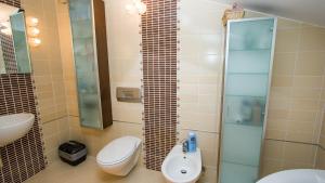 Kúpeľňa v ubytovaní Apartment Lunta