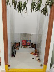 a view of a room with a white floor at Bhavya Enclave Ameenpur Spacious Flat in Hyderabad
