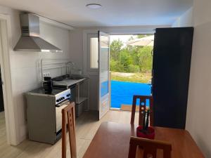 Η κουζίνα ή μικρή κουζίνα στο Cafu loft