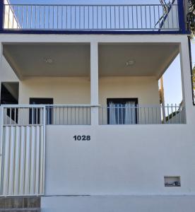 En balkon eller terrasse på Apartamento no centro da cidade + 4 billeder