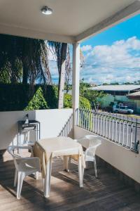 En balkon eller terrasse på Apartamento no centro da cidade