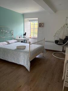 a bedroom with a bed and a window at Casa con piscina in Cedeira +33 photos
