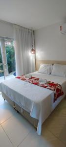 Postel nebo postele na pokoji v ubytování Suite com jacuzzi privativa