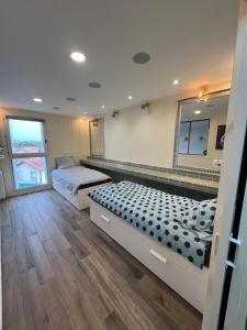 Una cama o camas en una habitación de Le duplex