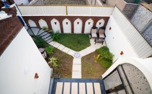 an overhead view of a backyard with a garden at The Village House with Private Garden - Four Bedroom Nubian Home on Luxor West Bank in Luxor