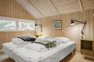 Ένα ή περισσότερα κρεβάτια σε δωμάτιο στο HA275-Hals-Bisnapvej-10