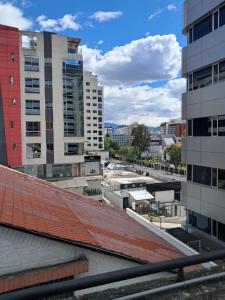 a view from the roof of a building at Cozy, fashionable and stylish room in Quito +4 photos