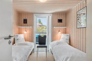 Ένα ή περισσότερα κρεβάτια σε δωμάτιο στο HA141-Hals-Gyvelvej-3-B