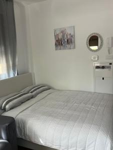 Ένα ή περισσότερα κρεβάτια σε δωμάτιο στο Apartman AS