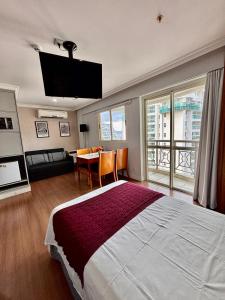 Кровать или кровати в номере Barra Premium-Flat 1203-4 Praia, Piscina, Academia