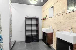a bathroom with a sink and a mirror at OH376-Hadsund-Sommerland-56-a in Hadsund