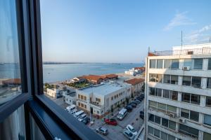 a view of a city from a window at MeTHEA in Thessaloniki