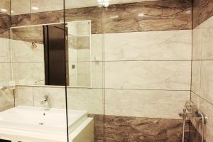 Koupelna v ubytování Hotel Nuanti