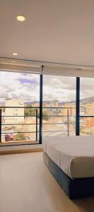 Ένα ή περισσότερα κρεβάτια σε δωμάτιο στο Amazing loft in Santa Barbara
