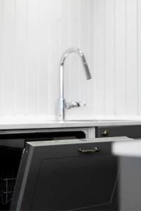 a kitchen with a sink and a sink at FY361-Asperup-Eskelundsvej-18 in Asperup +25 photos