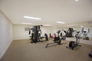 a gym with several exercise bikes in a room at Cotton Beach 94 Mid-Floor Penthouse with Bush View in Casuarina